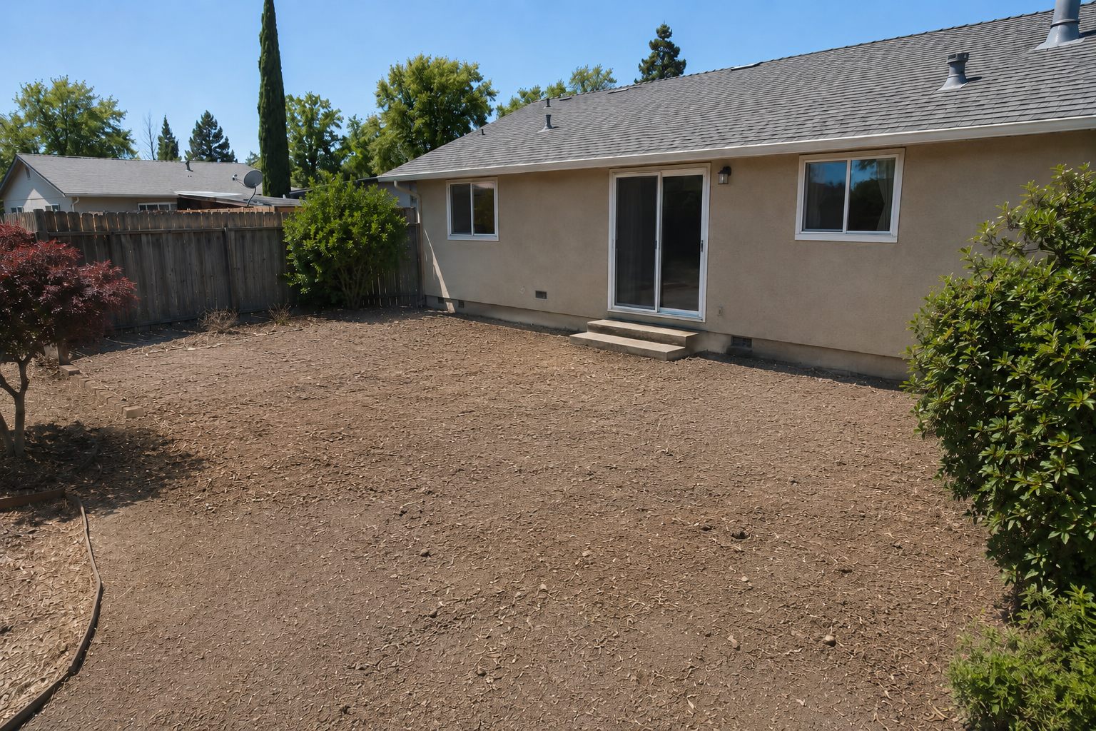 Cleared and graded patio area after demolition