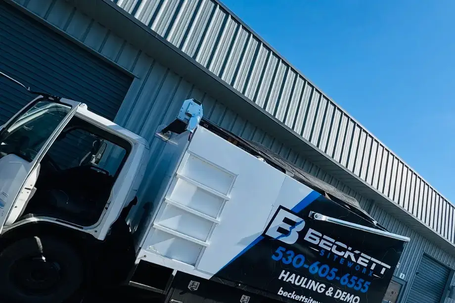 Beckett Siteworx hauling truck at a storage unit cleanout