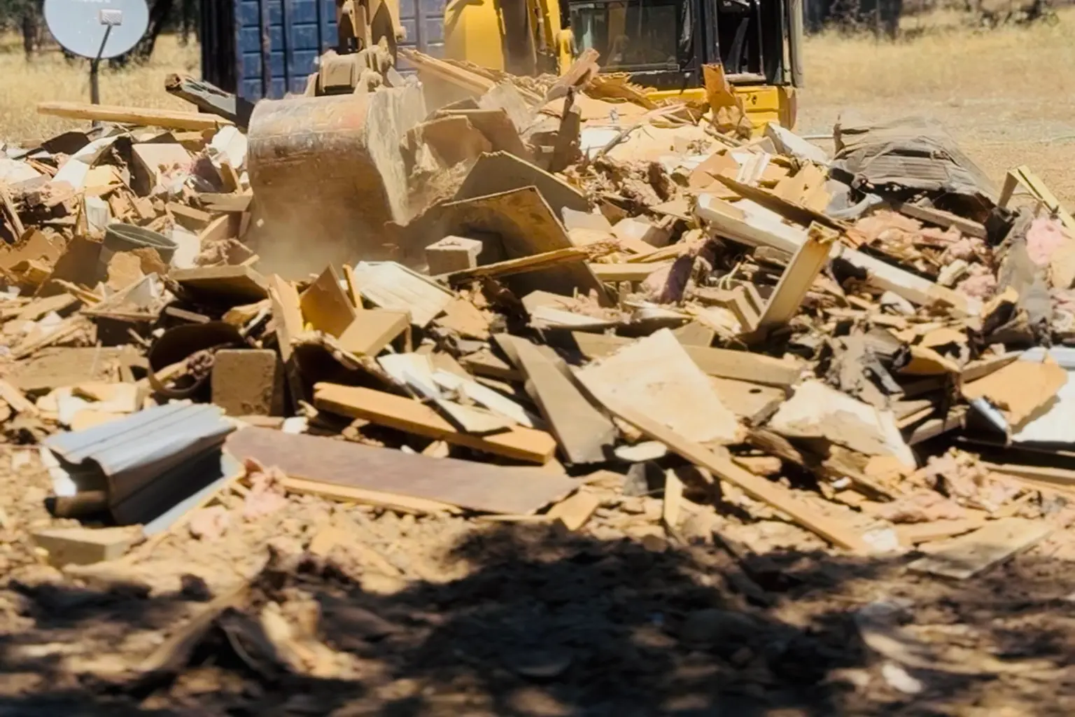 Debris pile being cleared during a hoarder cleanout